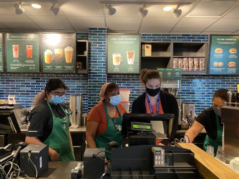 Starbucks employees work together at Harpers new Starbucks store on Sept. 27, 2021. (photo by Khushi Ghandi)