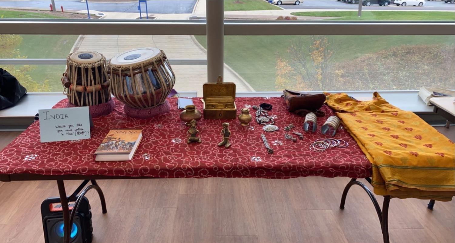 A display of artifacts sits on a table at the World Culture Fair organized by International Students Club in Avanté on Nov. 18, 2021. (Photo by Khushi Gandhi.)