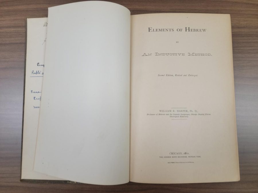 This book, Elements of Hebrew by William Rainey Harper, is the oldest publication in Harpers library. (Photo by Ari McKellin)