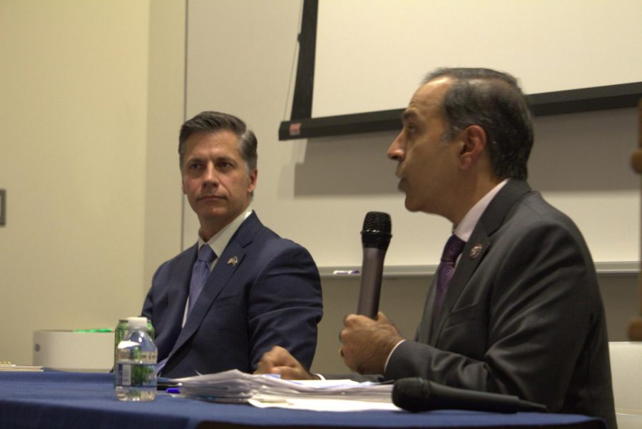 Raja Krishnamoorthi (D) takes the mic against opponent Chris Dargis (R) at a candidate panel for the 8th district Illinois congressional race on October 20, 2022 at Harper College. (Photo by Khushi Gandhi)