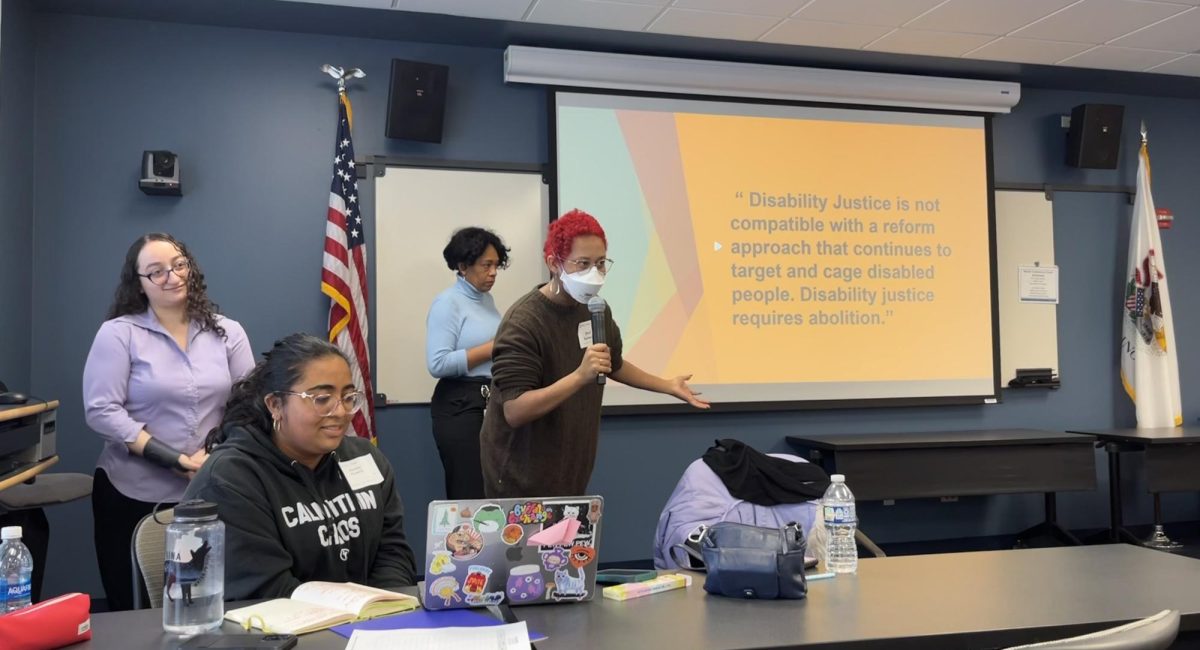 Students Hannah Miller, Amelie Pineda, and Zale Holmes presenting on Disability Justice and Abolition at the Disability Symposium on March 7th. (Photo by Tori Malek)