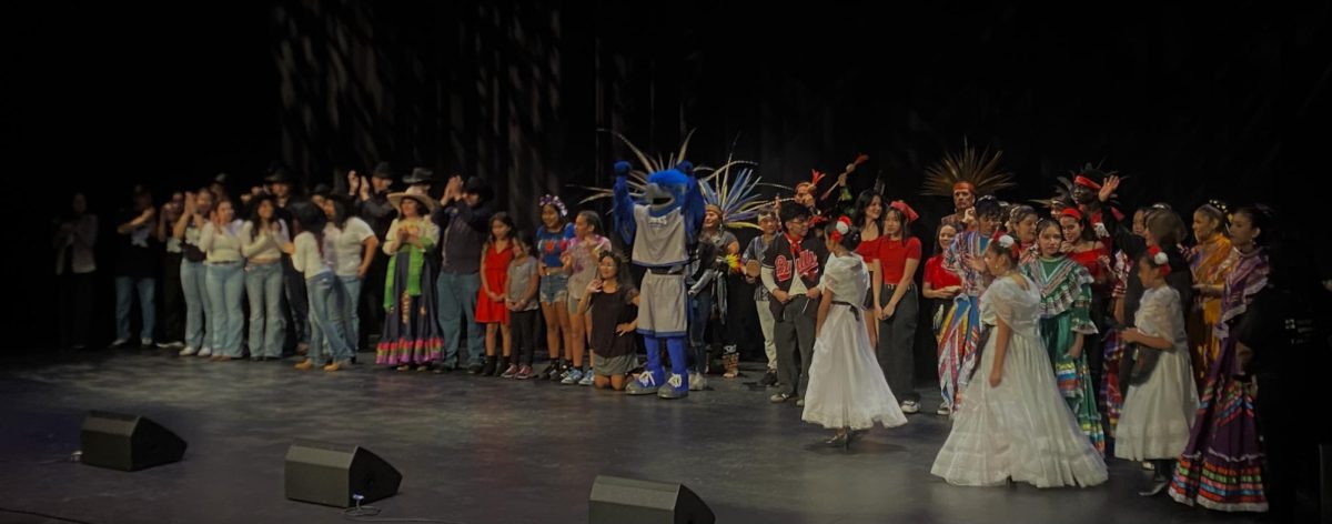 Everyone from Harper who participated in the 25th annual Sabor Latino event takes a bow on Oct. 11, 2024. (Photo by Hector Rodriguez)