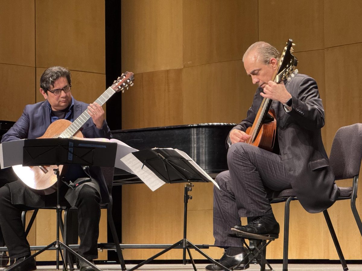 Guitarists Brian Torosian and Steve Vazquez perform a duet during Spring Fest at Harper College on April 5th, 2025. (Photo by Sara Seagraves)