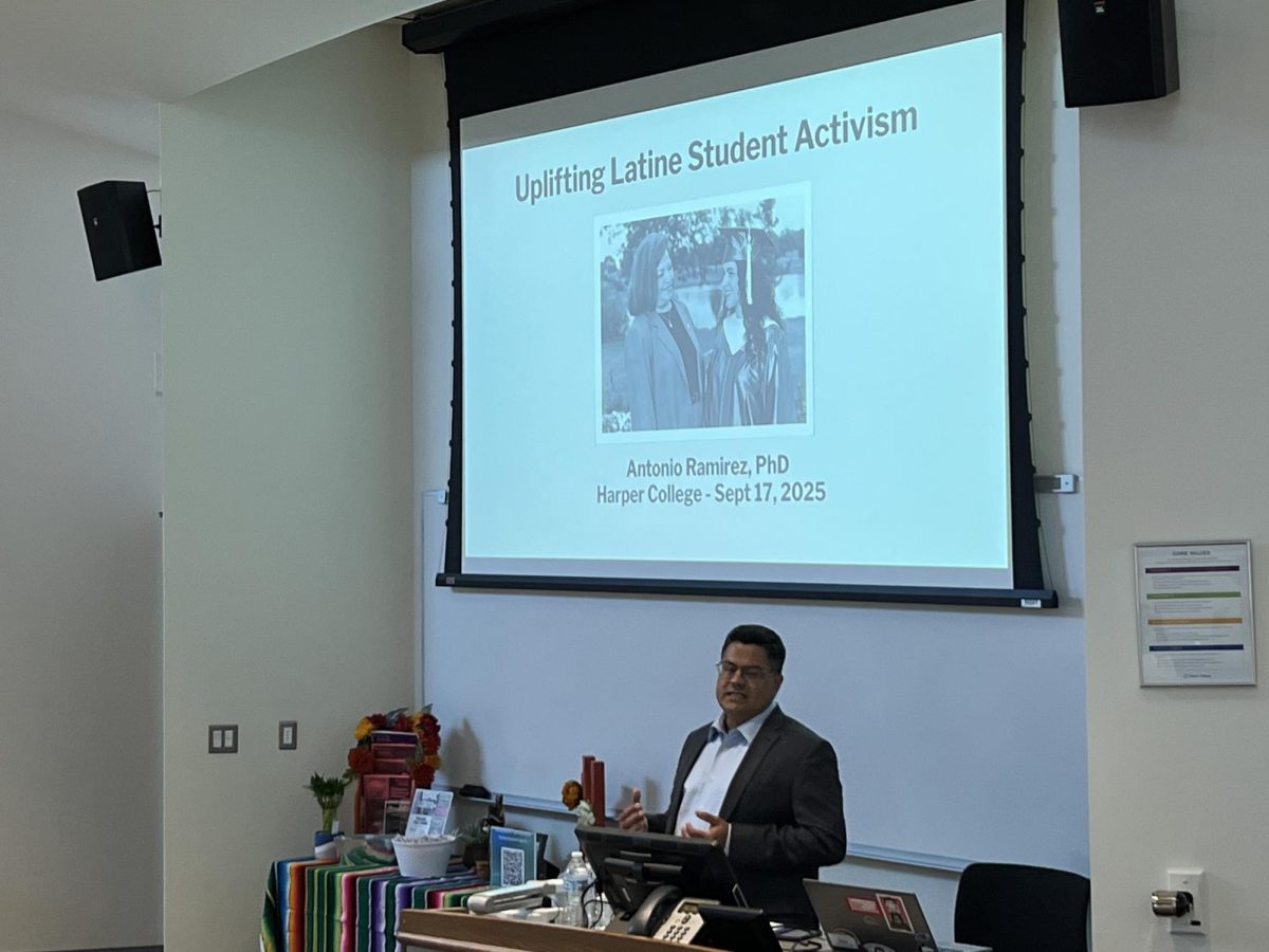 Dr. Ramirez starts his presentation with a quick introduction of themselves at the Chicagolandia: Uplifting Latine Student Activism event on September 17th, 2025. (Photo by Hector Rodriguez).
