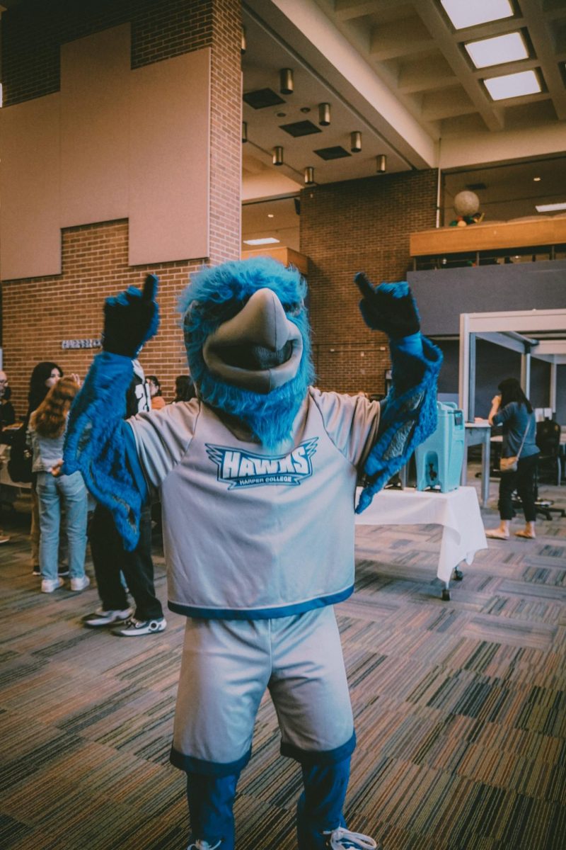 Harper mascot The Hawk hypes up the crowd and greets new students at Harper Fiesta on September 22nd, 2025. (Photo by Gaby Rosales)