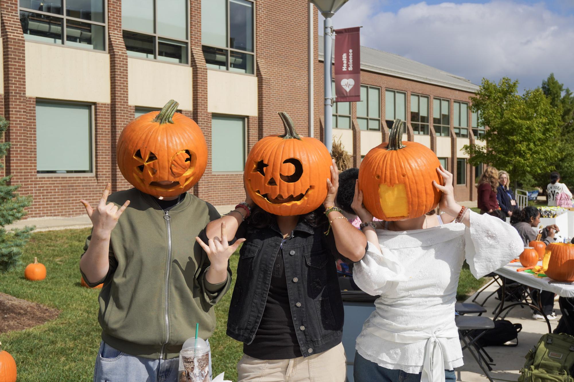 Creativity was on full display as students carved and wore their pumpkins at Fall Fest on October 14th, 2025. (Photo by Gaby Rosales)