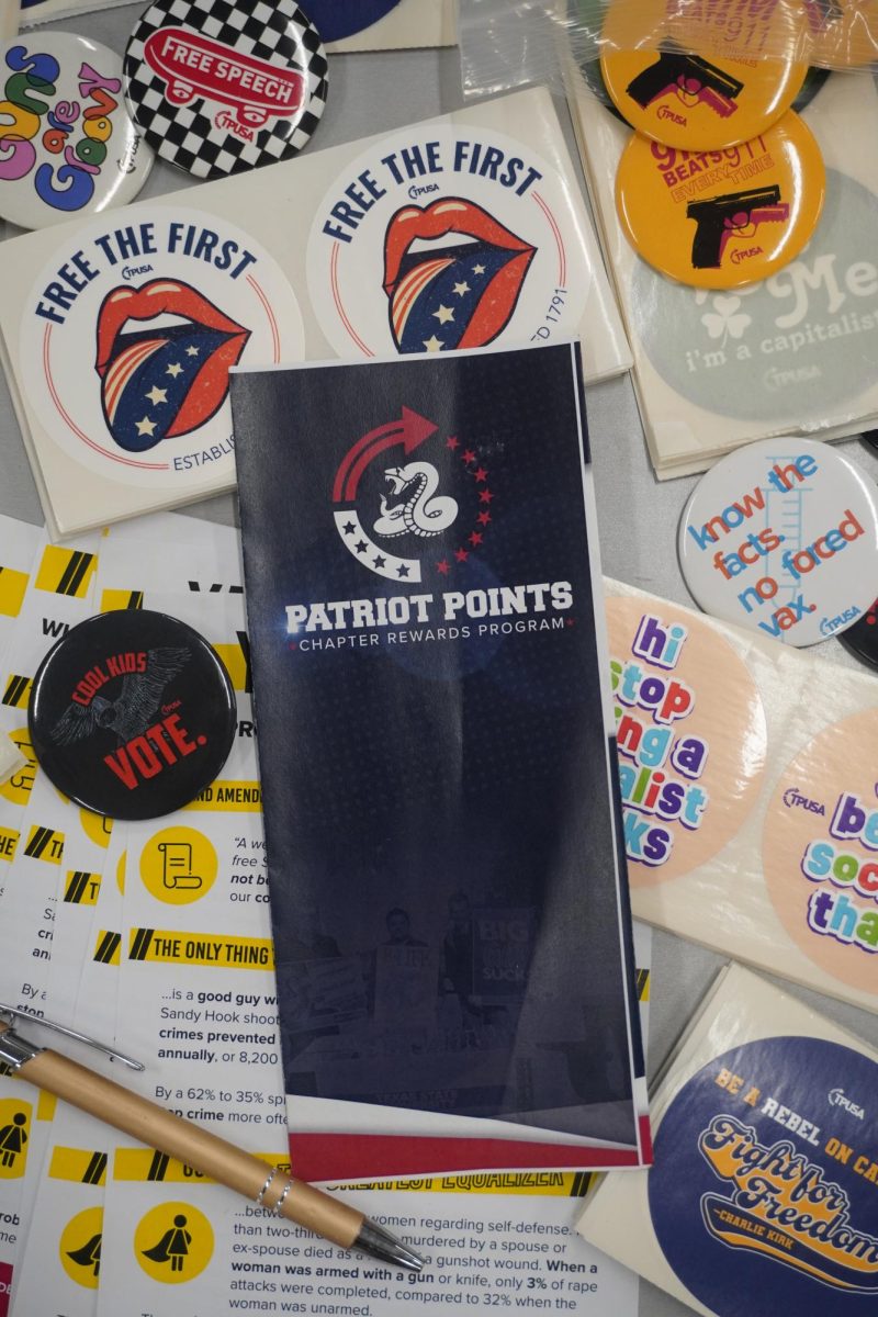 Photo of the merch TPUSA hands out at club meetings and events. (Photo by Gaby Rosales)