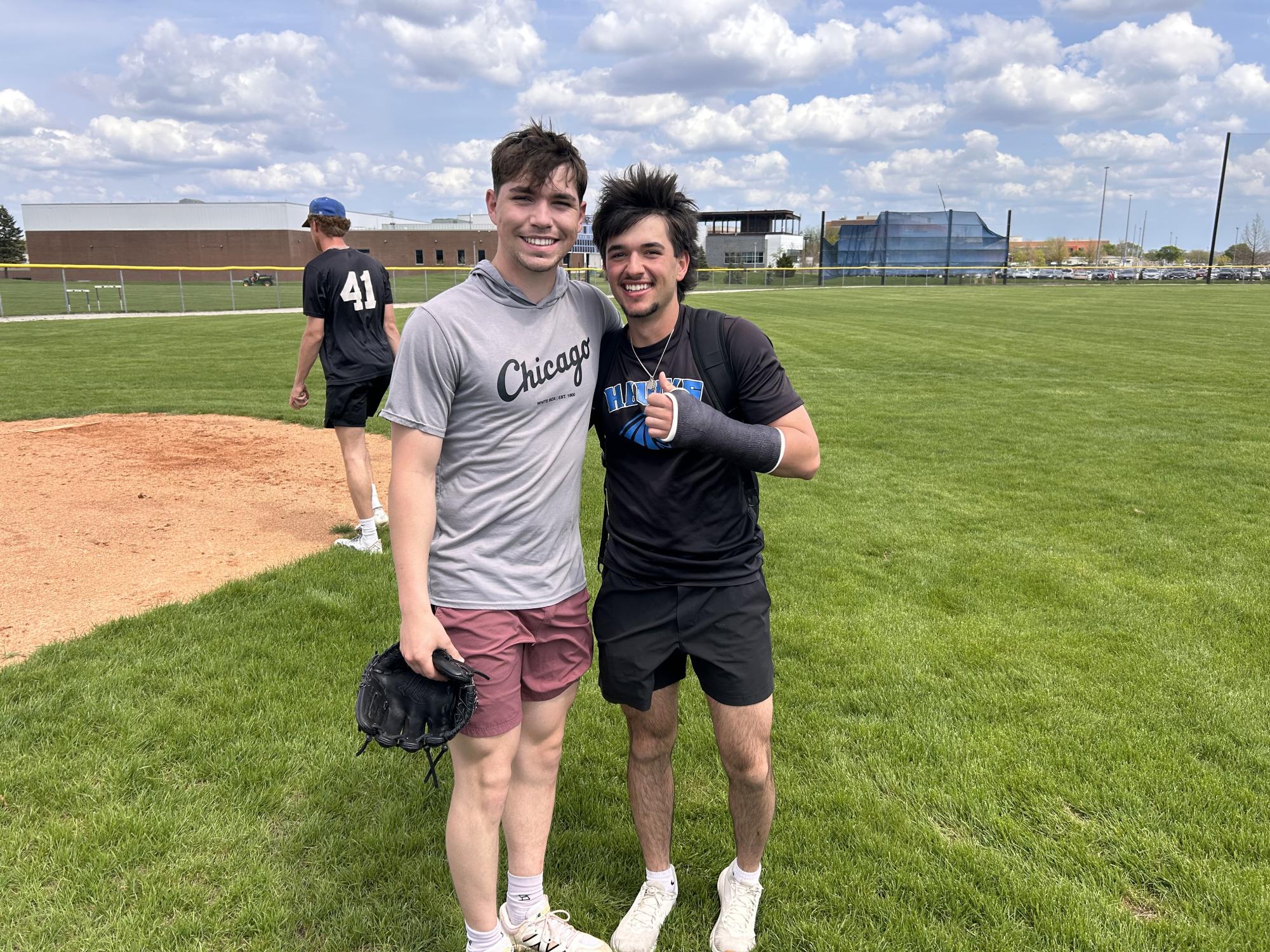 Mason Hulligan poses with teammate Michael Mango after practice on April 23rd. (Photo by
Ryan Contreras-Betz)